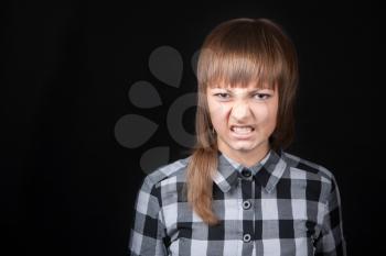 Royalty Free Photo of a Young Woman Snarling