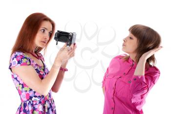 Royalty Free Photo of Two Girls Posing With an Analog Camera