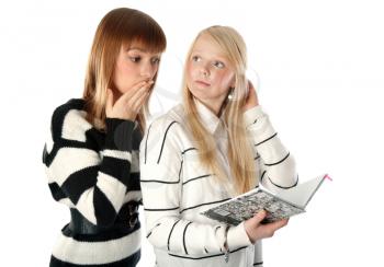 Royalty Free Photo of Two Girls Reading a Diary
