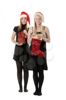 Royalty Free Photo of Two Girl Holding Christmas Stockings