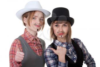 Royalty Free Photo of Two Girls With Drawn on Mustaches