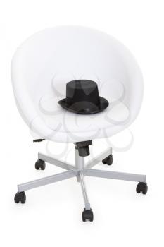 Royalty Free Photo of a Hat on a Chair