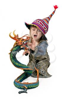 Royalty Free Photo of a Little Girl With a Dragon Statue