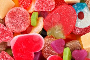 chewy colored candies in the shape of the background