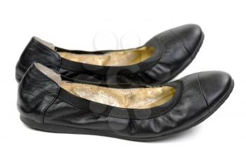 A pair of black leather shoes ballet flats. Isolate on white.