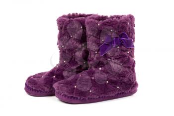 Pair of purple warm fur boots. Isolate on white.