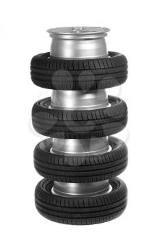Stack of car wheels and tires. Isolate on white.