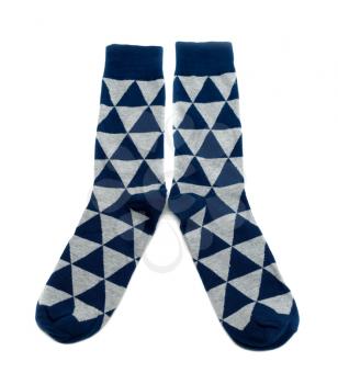 A pair of socks in a diamond pattern, blue and gray. Isolate on white.