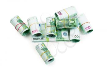 Euro banknotes in stacks and rolls isolate on white
