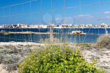 Sea view and beach through the fence, Mallorca, Spain
