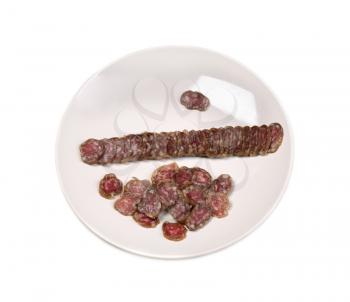 Plate with sausage sliced Fouette, isolate on a white background