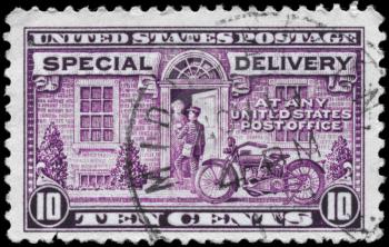 Royalty Free Photo of a 1927 US Stamp of Postman and Motorcycle