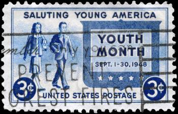Royalty Free Photo of 1948 US Stamp Shows the Girl and Boy Carrying Books, Youth of America and Youth Month