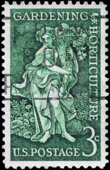 Royalty Free Photo of 1958 US Stamp Shows Bountiful Earth Allegory, Garden Clubs of America and Century of the Birth of Liberty Hyde Bailey, Horticulturist
