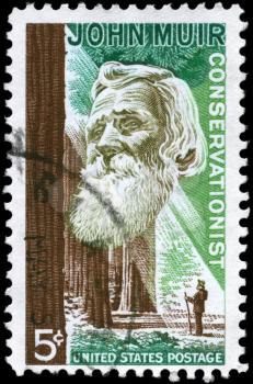 Royalty Free Photo of 1964 US Stamp Shows Portrait of John Muir (1838-1914) and Redwood Forest