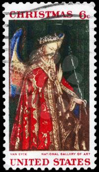 Royalty Free Photo of 1968 US Stamp Shows a Gabriel, from the Annunciation, by the Flemish Artist Jan van Eyck (1395-1441), National Gallery of Art, Washington