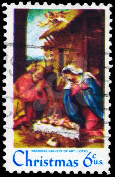Royalty Free Photo of 1970 US Stamp Shows the Nativity by Lorenzo Lotto (1480-1556), National Gallery of Art, Washington