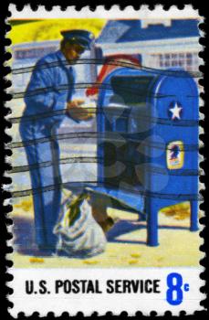 Royalty Free Photo of 1973 US Stamp Shows the Mail Collection, Postal Service Employees