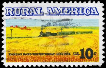 Royalty Free Photo of 1974 US Stamp Shows the Wheat Fields and Train, Rural America