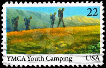 Royalty Free Photo of 1985 US Stamp Shows the YMCA Youth Camping, Centenary, International Youth Year
