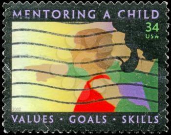 Royalty Free Photo of 2002 US Stamp Shows Child and Adult, Mentoring a Child Issue