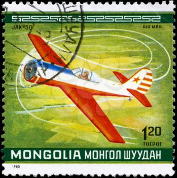 MONGOLIA - CIRCA 1980: A Stamp printed in MONGOLIA shows the JAK-50 Plane, USSR, from the series 10th World Aerobatic Championship, circa 1980