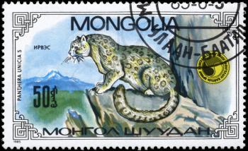 MONGOLIA - CIRCA 1985: A Stamp printed in MONGOLIA shows image of a Leopard on the Rock, with the description Panthera unicias, series, circa 1985