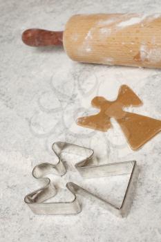 Royalty Free Photo of a Cookie Cutter and a Rolling Pin