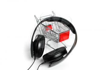 Royalty Free Photo of a Miniature Cart and Headphones