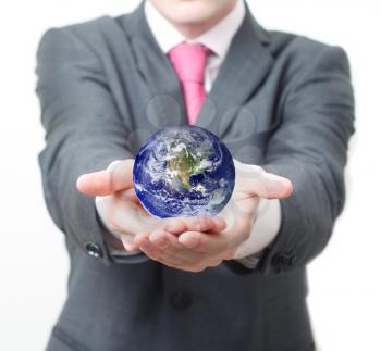 Royalty Free Photo of a Businessman Holding a Globe