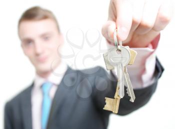 Royalty Free Photo of a Businessman Holding Keys