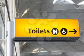 Royalty Free Photo of a Toilets Sign at an Airport