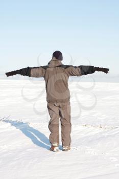 Royalty Free Photo of a Person Standing Outside