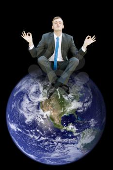 Royalty Free Photo of a Man on Top of the World