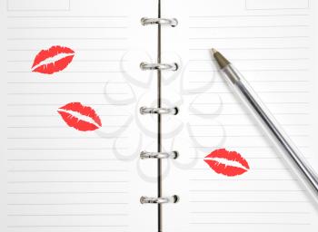 Royalty Free Photo of Lipstick in an Agenda