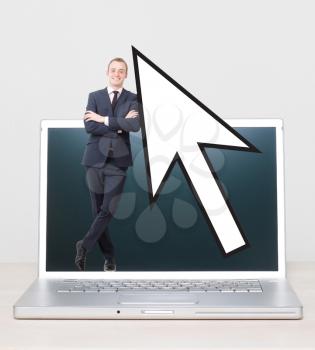 Royalty Free Photo of a Businessman in a Laptop
