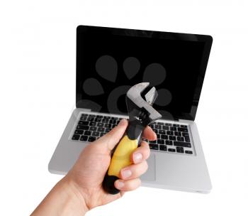 Royalty Free Photo of a Person Fixing a Laptop
