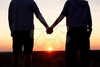 Royalty Free Photo of a Couple Holding Hands