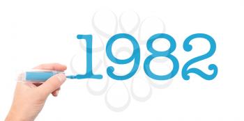 The year of 1982written with a marker
