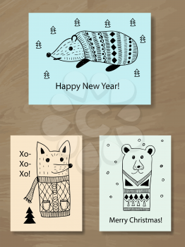 Vector Christmas Greeting Cards with Doodle Animals