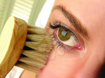 Royalty Free Photo of Woman With a Brush
