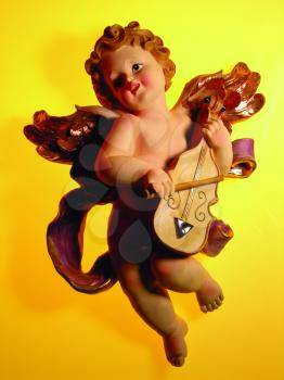 Royalty Free Photo of an Angel Figurine With a Violin