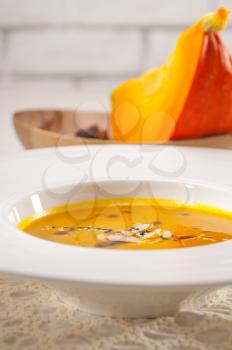 fresh classic traditional natural  pumpkin soup closeup macro