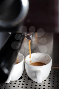 Italian espresso coffe making with professional machine macro 