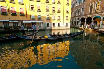 Royalty Free Photo of Gondolas Parked on a Canal in Venice