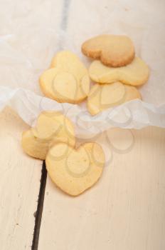 fresh baked heart shaped shortbread valentine day cookies on a paper wrap
