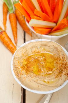 fresh hummus dip with raw carrot and celery arab middle eastent healthy food 