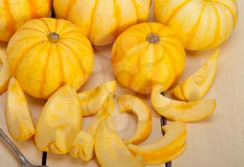 bunch of fresh yellow pumpkins just collected from garden 