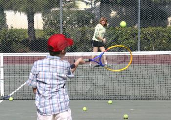 Royalty Free Photo of People Playing Tennis