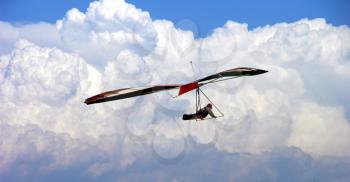 Royalty Free Photo of a Hangglider in the Sky